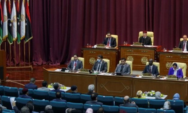Libyan Parliament meet to discuss approving new government. (Reuters)