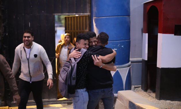 FILE photo: A group of pretrial detainees leaves prison