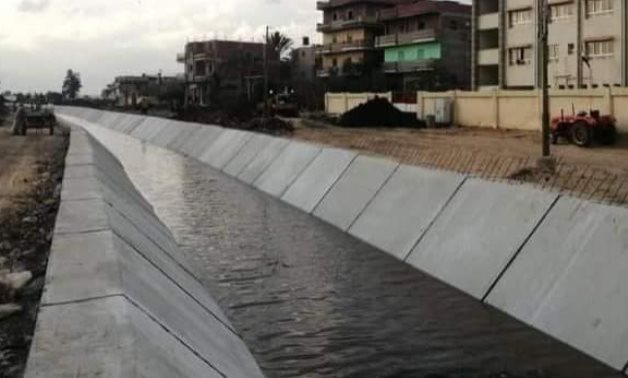 FILE – Canal lined in Egypt