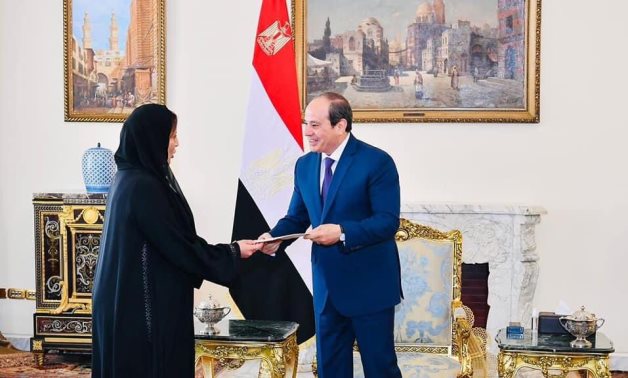 Emirati Ambassador to Cairo Mariam al-Kaaby hands handwritten invitation from UAE President Sheikh Mohamed Bin Zayed al-Nahyan to President Abdel Fatah al-Sisi to attend COP 28. April 4, 2023. Press Photo