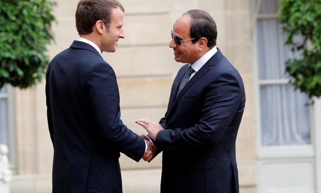 File- French President Emmanuel Macron receives President Abdel Fatah al-Sisi at the Elysee Palace Tuesday Oct.24, 2017 - Reuters