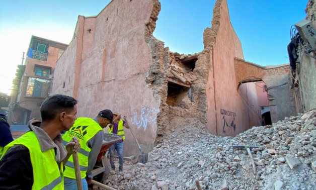 People work in the rubble in the historic city of Marrakech following the powerful earthquake that struck Morocco late on Friday. On September 9, 2023. © Abdelhak Balhaki, Reuters