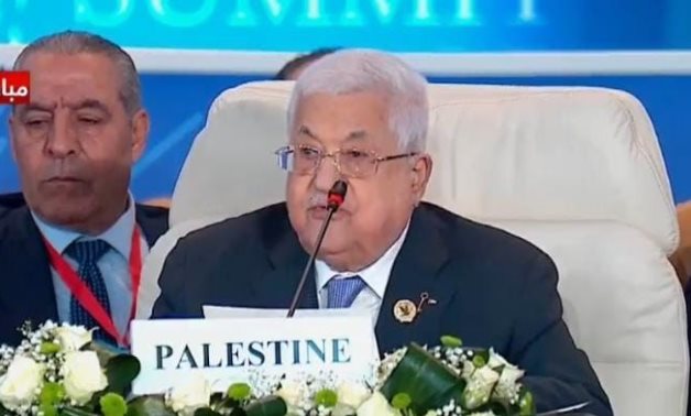 Palestinian President Mahmoud Abbas gives a speech at the Cairo Summit for Peace