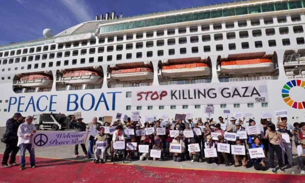 Japanese Peace Boat hoisting pro-Gaza banners