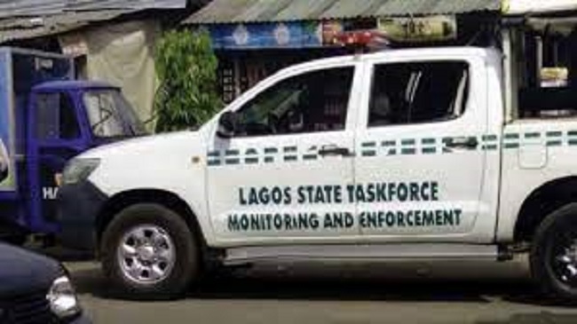 hoodlums attack Lagos task force operatives, street trading