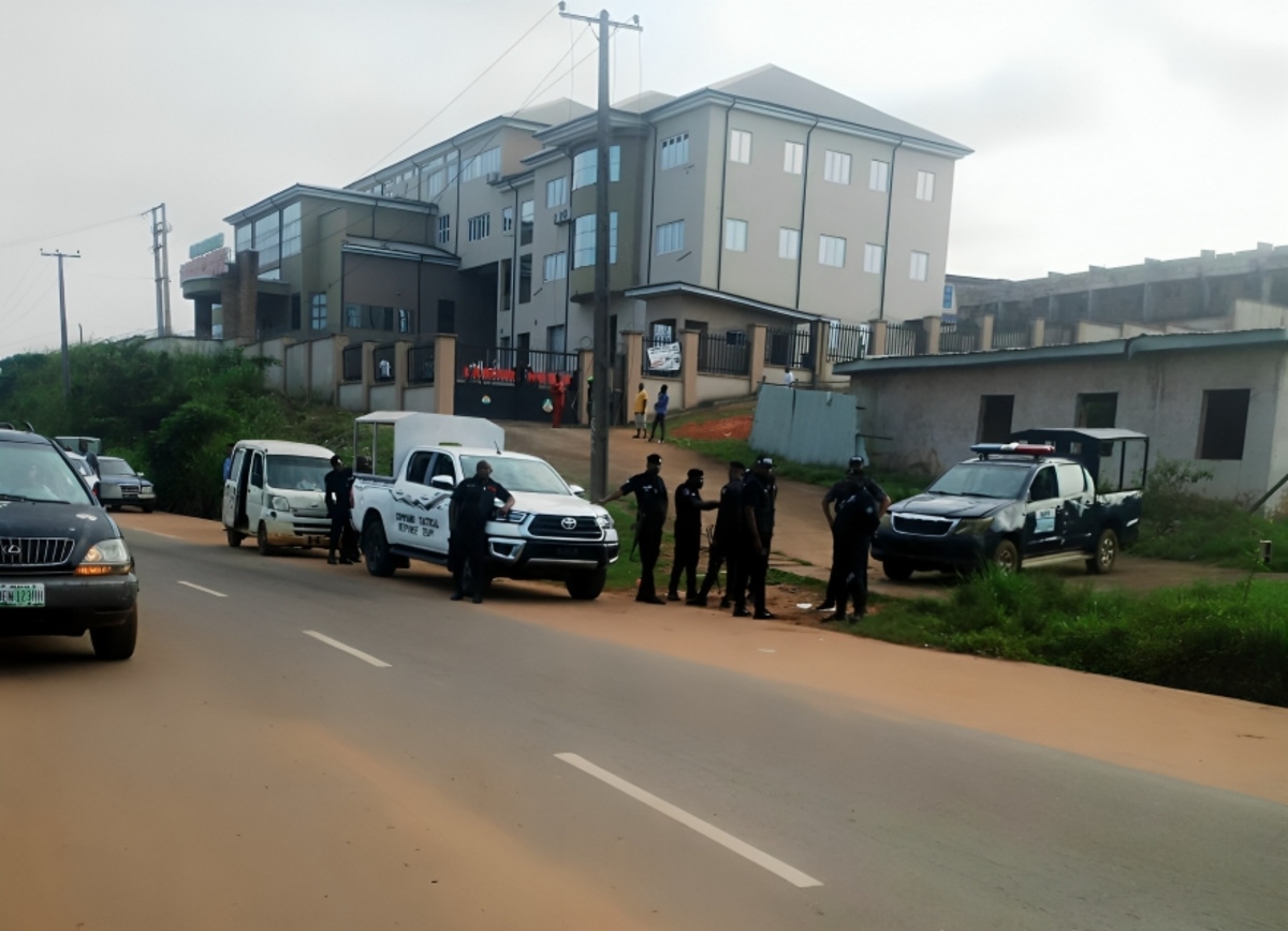 Operatives of the Nigeria Police Force at the Entrance of The Edo NLC Secretariat in Benin.