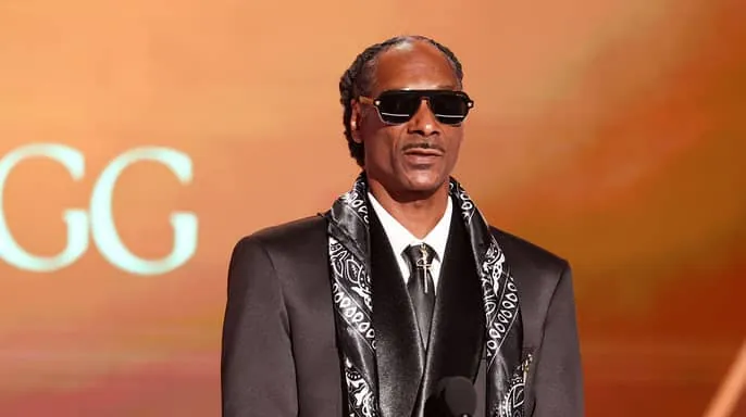 American rapper, Calvin Cordozar Broadus Jr., popularly known as Snoop Dogg posing for camera
