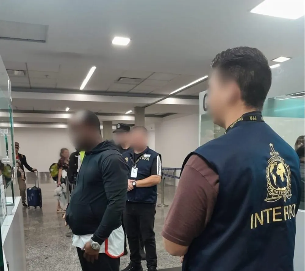 A Nigerian man arrested for romance scams and an INTERPOL officer
