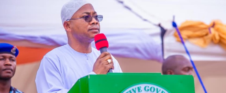 Kogi Governor, Alhaji Ahmed Usman Ododo holding a microphone