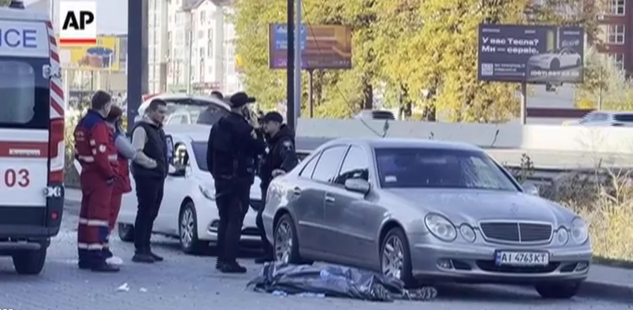 Emergency workers inspect damage following Russian attacks in Ukraine.